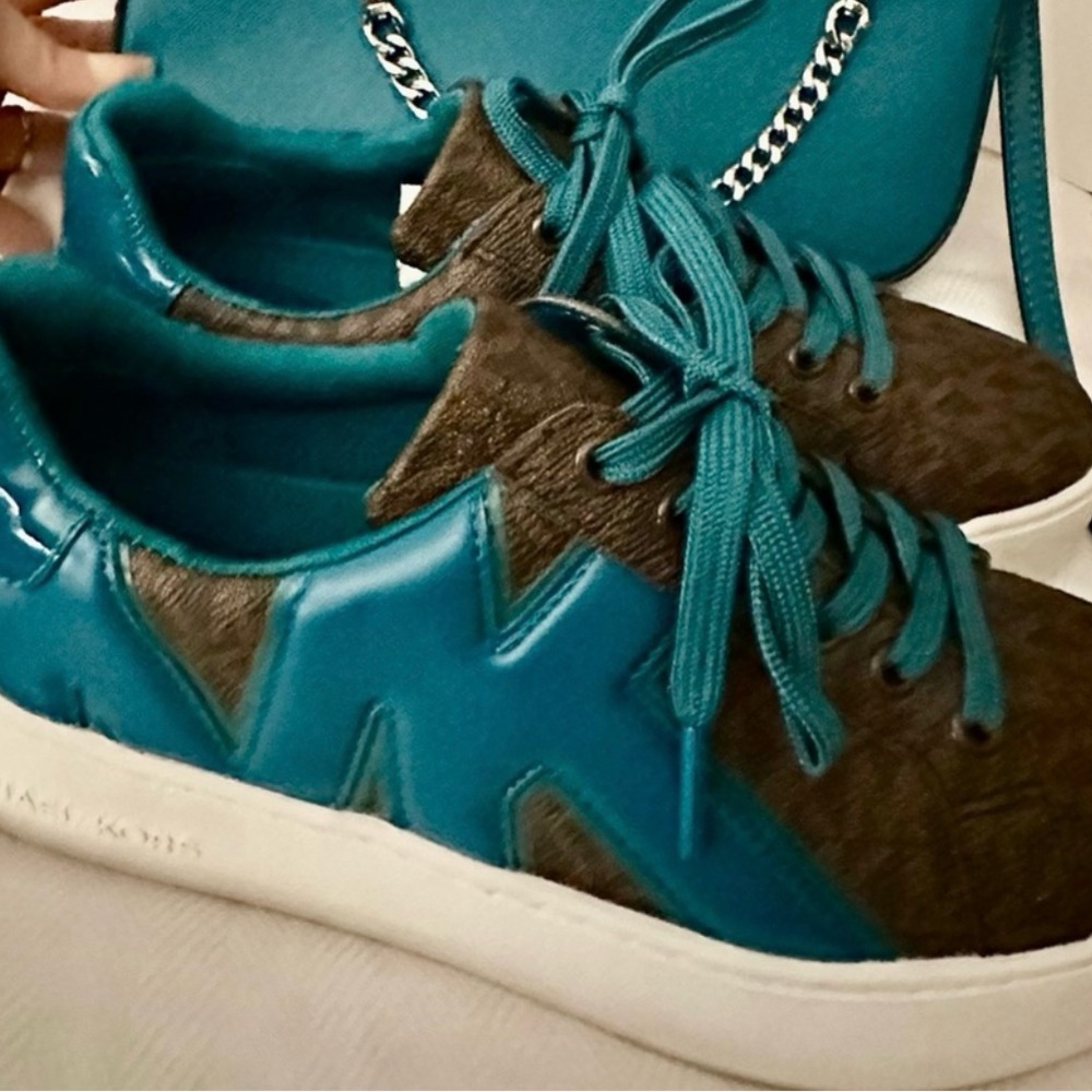 Like new teal color Michael Kors shoes.